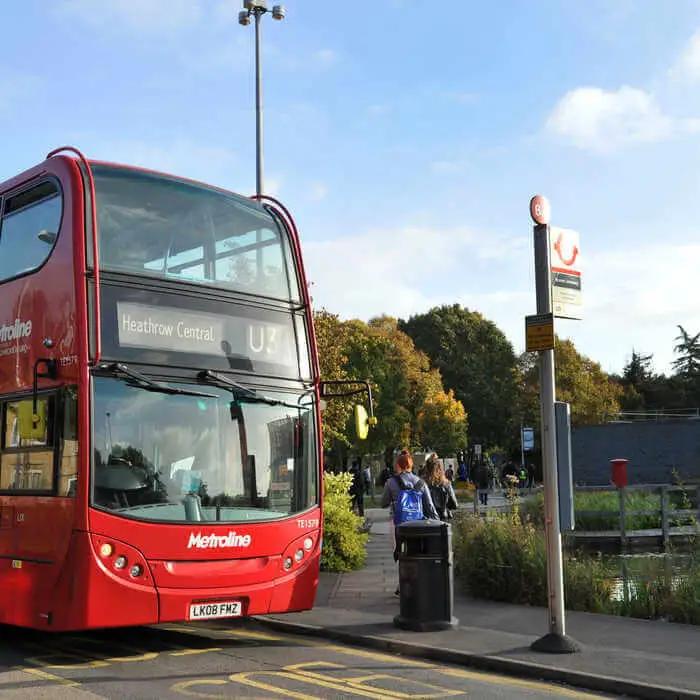 Bus stopping at Brunel University bus stop