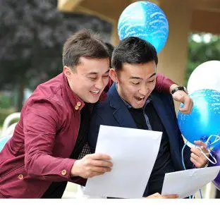 students receiving results and scholarships for fees and funding