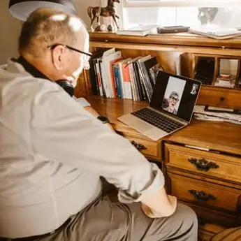 old man on laptopn