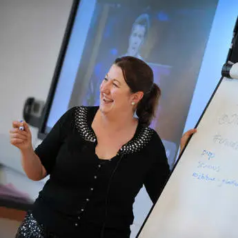 female academic giving a lecture